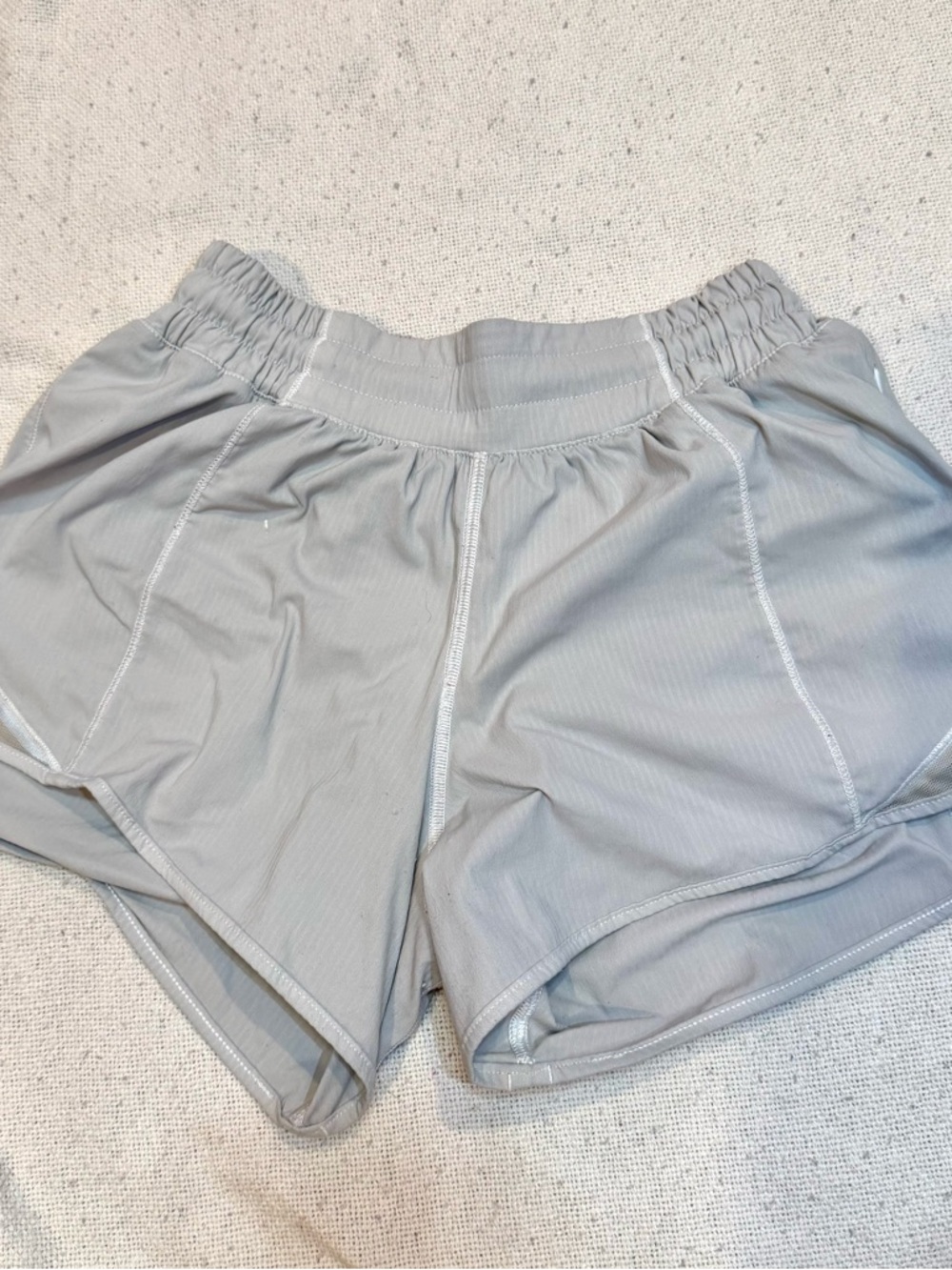 faded white hottie hot 2.0 size 4 lululemon athletica running shorts